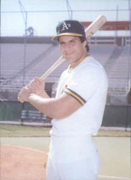 1986 Card Collectors Jose Canseco #8 Jose Canseco / Ready to swing, bat on shoulder Front