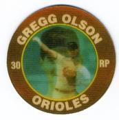 1991 Score 7-Eleven Superstar Action Coins: Atlantic Region #10 HS Gregg Olson Front