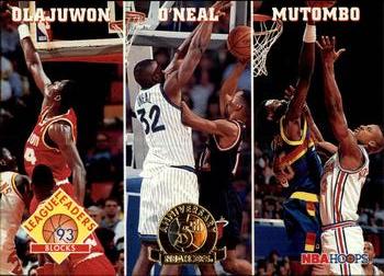 1993-94 Hoops - Fifth Anniversary Gold #290 Blocks (Hakeem Olajuwon / Shaquille O'Neal / Dikembe Mutombo) Front