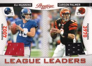 2011 Panini Prestige - League Leaders Materials #3 Eli Manning / Carson Palmer Front