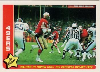 1985 Fleer Team Action #75 Waiting to Throw until His Receiver Breaks Free Front