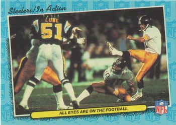 1986 Fleer Team Action #66 All Eyes are on the Football Front