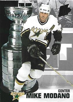 2002-03 Pacific Quest for the Cup - Raising the Cup #4 Mike Modano Front