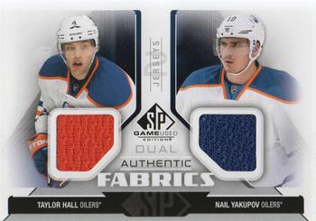 2014-15 SP Game Used - Authentic Fabrics Dual #AF2-HY Taylor Hall / Nail Yakupov Front