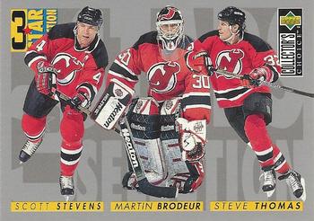 1996-97 Collector's Choice #322 Scott Stevens / Martin Brodeur / Steve Thomas Front