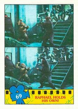 1990 O-Pee-Chee Teenage Mutant Ninja Turtles: The Movie #69 Raphael Holds His Own! Front