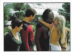1987 Panini Star Trek: The Next Generation Stickers #185 Troi and Riker watching Worf get kissed by Rivan Front