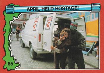 1991 Topps Teenage Mutant Ninja Turtles II: The Secret of the Ooze #65 April Held Hostage! Front