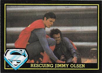 1983 Topps Superman III #23 Rescuing Jimmy Olsen Front