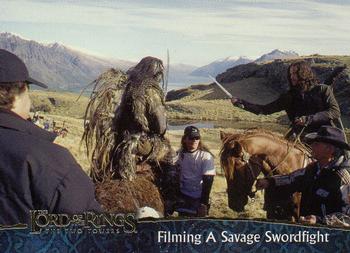 2002 Topps Lord of the Rings: The Two Towers #87 Filming A Savage Swordfight Front