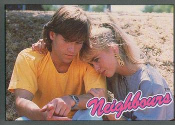 1988 Topps Neighbours Series 2 #55 Jane (Annie Jones) comforts Mike (Guy Pearce) afte Front