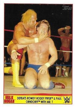 2015 Topps WWE - Hulk Hogan Tribute #2 Defeats Rowdy Roddy Piper & Paul Orndorff with Mr. T Front