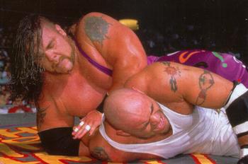 1998 Panini WCW/nWo Photocards #96 Hugh Morrus vs Konnan Front