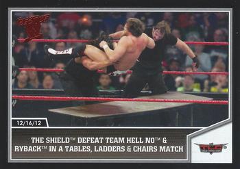 2013 Topps Best of WWE #68 The Shield Defeat Team Hell No and Ryback in a Tables, Ladders and Chairs Match Front