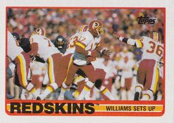 1989 Topps #250 Redskins Team Leaders (Williams Sets Up) Front
