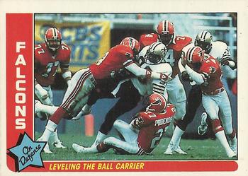1985 Fleer Team Action #2 Leveling the Ball Carrier Front