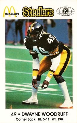 1984 Pittsburgh Steelers Police #NNO Dwayne Woodruff Front