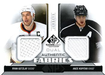 2014-15 SP Game Used - Authentic Fabrics Dual #AF2-GK Ryan Getzlaf / Anze Kopitar Front