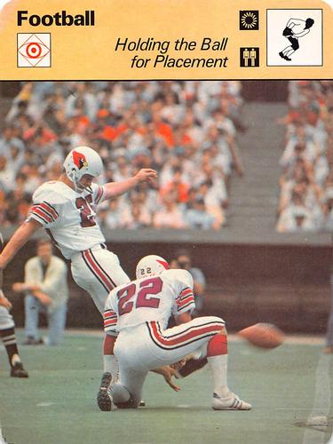 1977-79 Sportscaster Series 43 #43-12 Holding the Ball for Placement Front