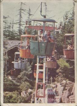 1965 Donruss Disneyland (Blue Back) #4 Departing from the Swiss Chalet in Fantasyland Guests on Disneyland Skyway Travel High Above the Magic Front