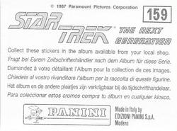 1987 Panini Star Trek: The Next Generation Stickers #159 Riker crouching as energy blast strikes Data and LaForge Back
