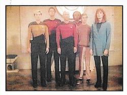 1987 Panini Star Trek: The Next Generation Stickers #210 Picard, Yar, Riker, Worf and the Crushers, waiting for beam-up Front