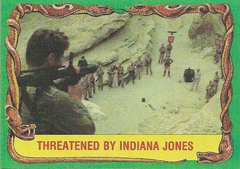 1981 Topps Raiders of the Lost Ark #78 Threatened By Indiana Jones Front