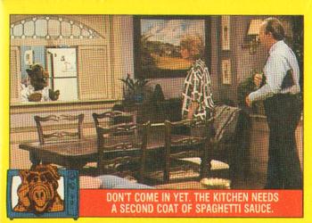 1987 Topps ALF #15 Don't come in yet. The kitchen needs a second coat of spaghetti sauce Front