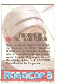 1990 Topps RoboCop 2 - Behind-the-Scenes Bonus #H Touching Up the Toxic Terror Back