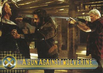 2000 Topps X-Men The Movie #19 A Gun against Wolverine Front
