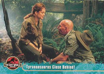 1997 Topps The Lost World: Jurassic Park #25 Tyrannosaurus Close Behind! Front
