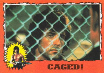 1985 Topps Rambo First Blood Part II #2 Caged! Front