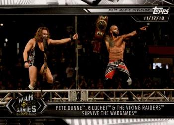 2019 Topps WWE NXT #65 Pete Dunne, Ricochet & The Viking Raiders Survive The WarGames Front
