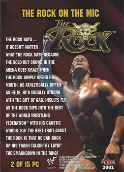2001 Fleer WWF Wrestlemania - The People's Champion #2 PC The Rock on the Mic  Back