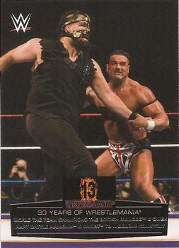 2014 Topps WWE Road to Wrestlemania - 30 Years of Wrestlemania #25 World Tag Team Champions The British Bulldog & Owen Hart Battle Mankind & Vader to a Double Countout Front